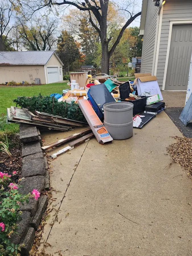 Dumpster being loaded with debris for Residential Dumpster Rental in Yucaipa